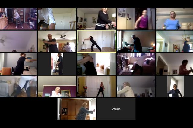 A Zoom screen showing 20 seniors in various stages of their home workout, some with handweights